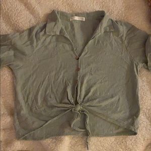 Potter’s por button up blue tee with tie